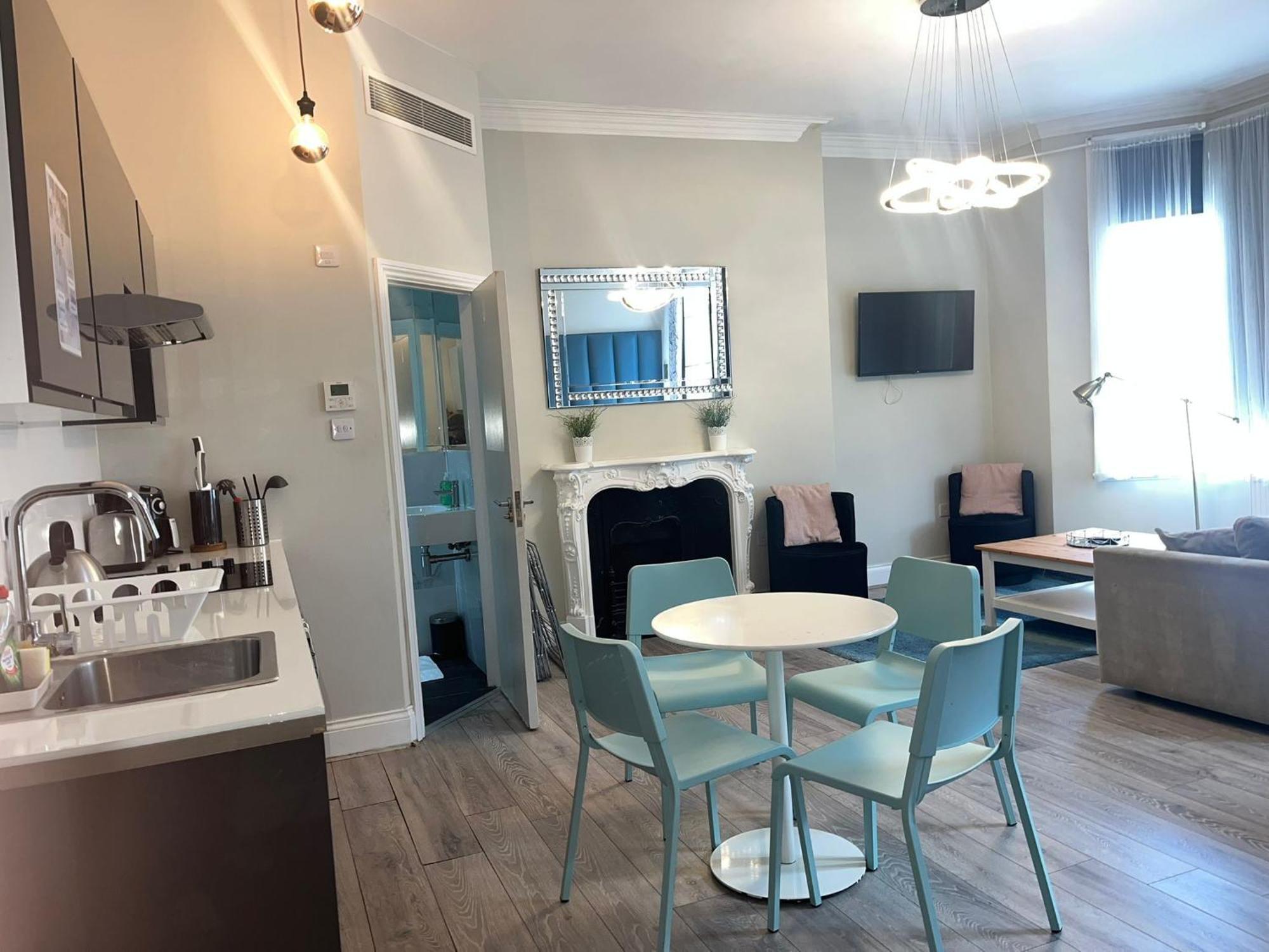 Apartments In The Heart Of High Street Kensington Лондон Номер фото